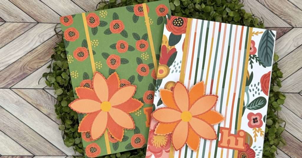 floral card featuring two smaller side panels and one larger middle panel separated by a thin strip of card stock on a portrait style card. Hi sentiment and an orange flower for embellishment For A2 Paper Busting Template for A2 Cards #9 by Jess Crafts